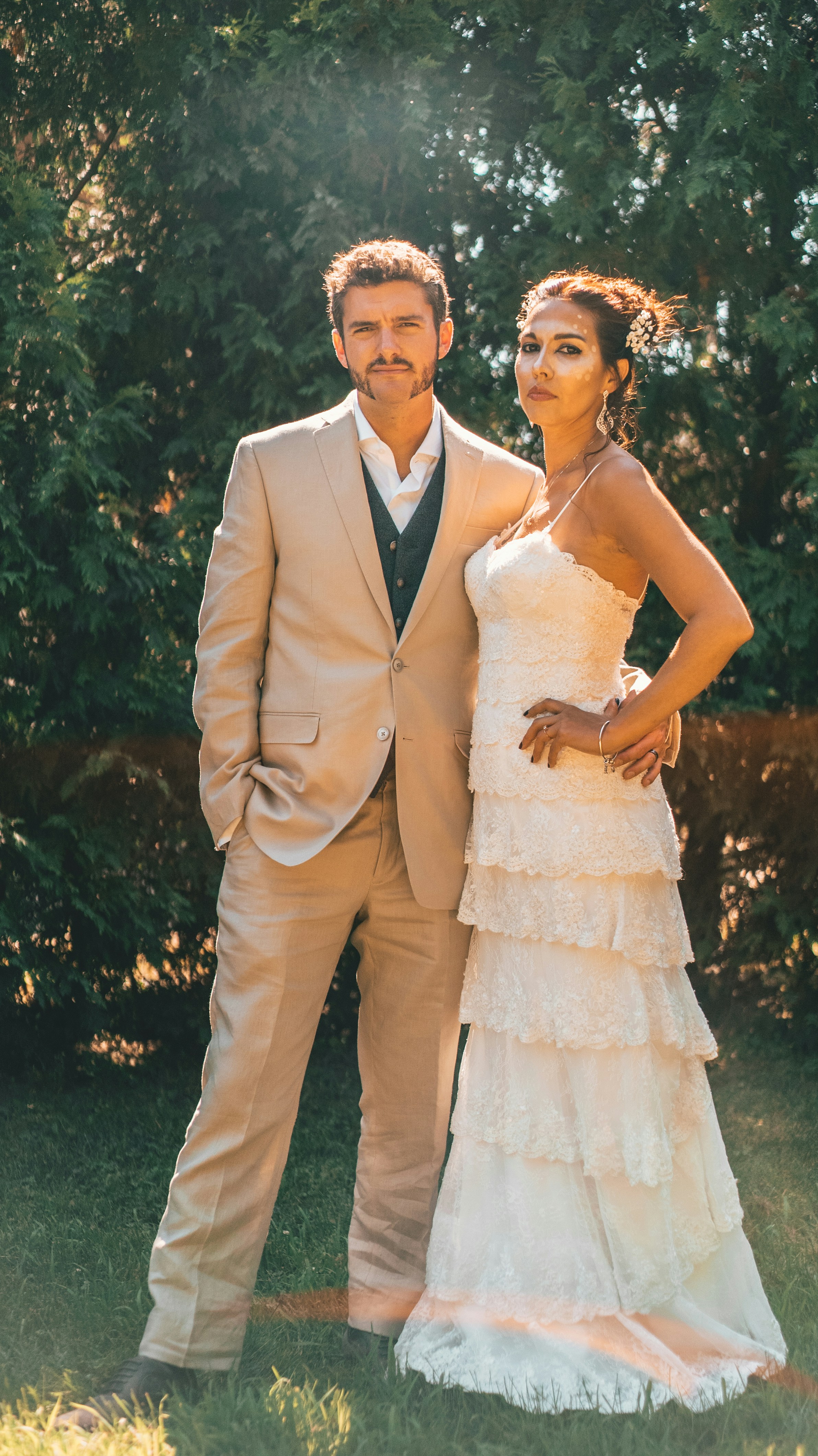 Man in Tan Suit and Woman with a Dress